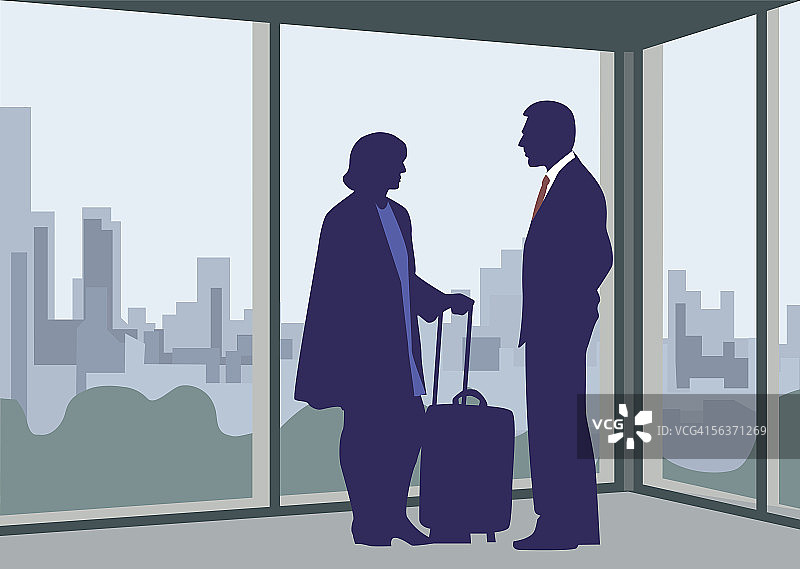 男人和女人站在机场的窗前图片素材