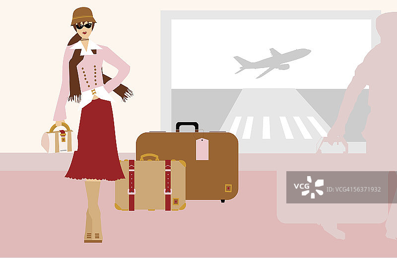 在机场拿着行李的女人图片素材