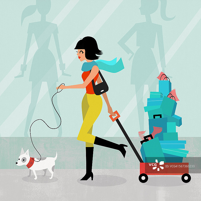 拉着装满购物袋的手推车的漂亮女人和她的宠物图片素材