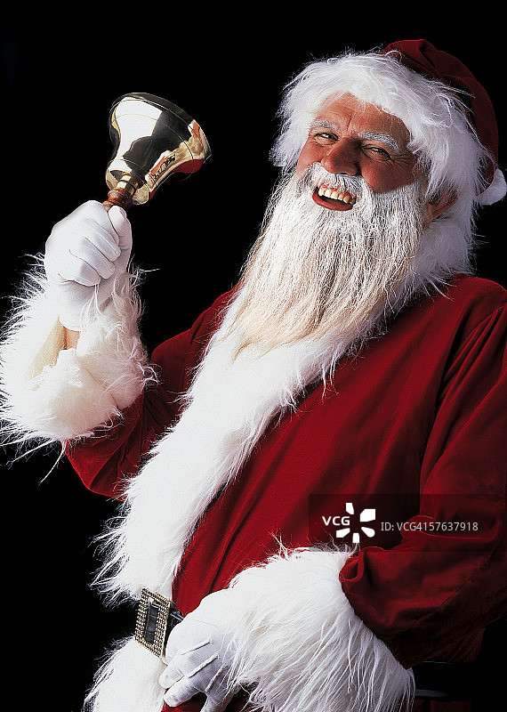 摇手铃的欢乐圣诞老人图片素材