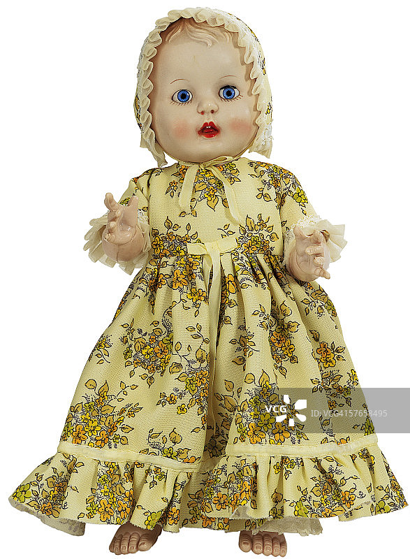 戴帽子和连衣裙的女性玩偶图片素材