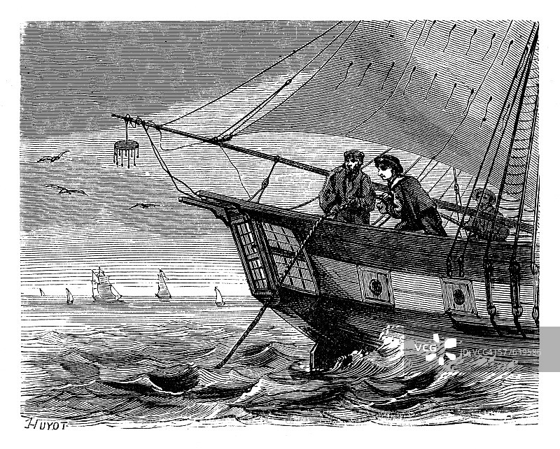 电缆船上的船员释放电报电缆图片素材