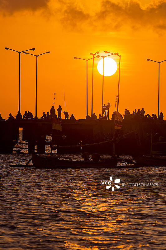 印度尼西亚巴厘岛金巴兰海滩日落图片素材