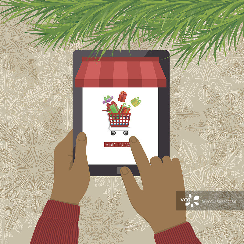 在线圣诞购物概念：使用平板电脑图片素材