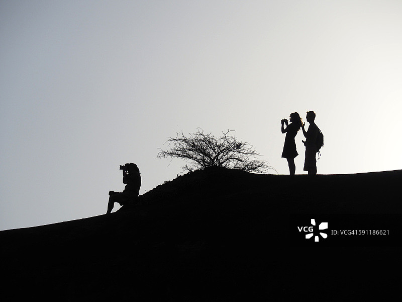 拍照人群剪影图片素材