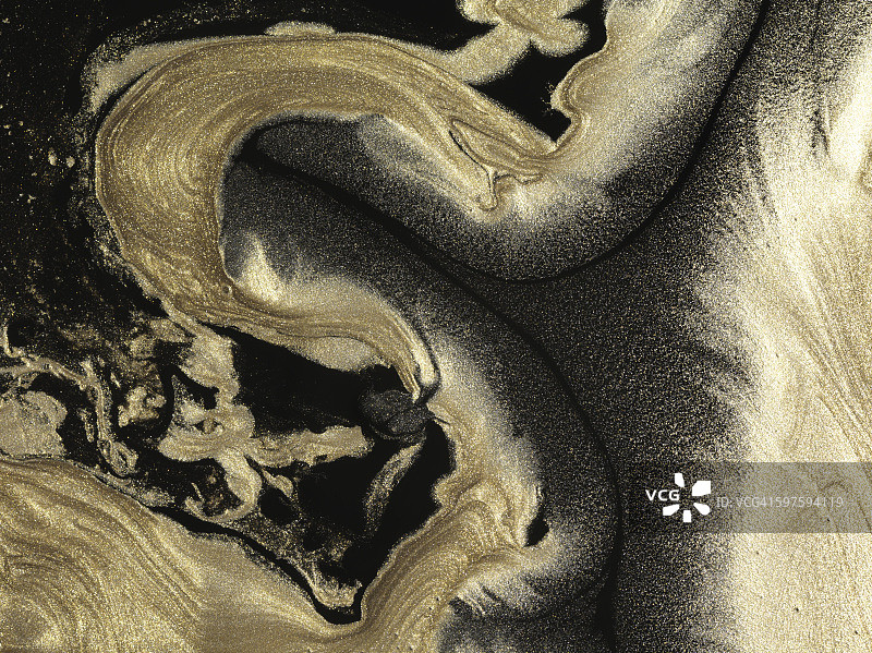 黑色背景上的金色闪光图案图片素材