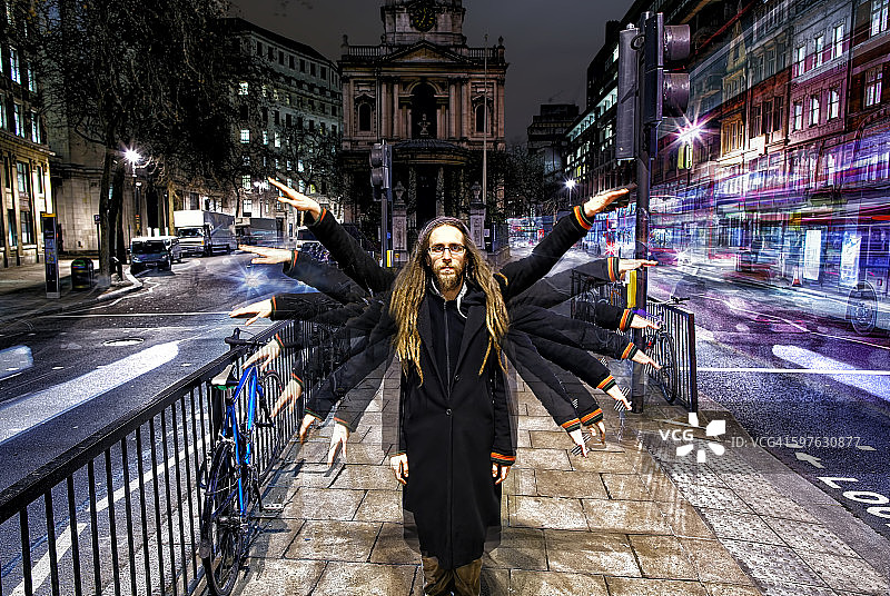 多重曝光下的多只手臂图片素材