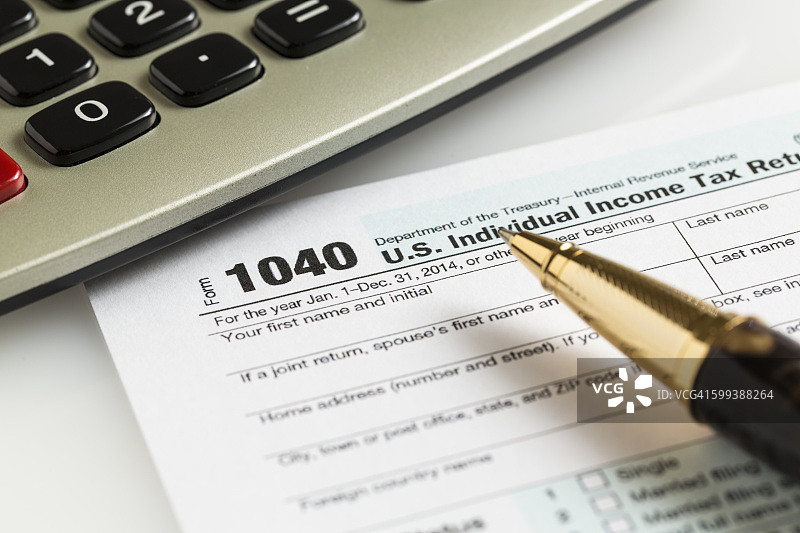 美国1040税表（2014年）及计算器，图示如何填写美国国税局税务表格图片素材