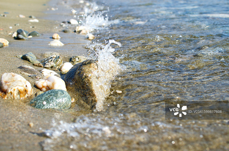 提诺斯岛海滩岩石表面图片素材