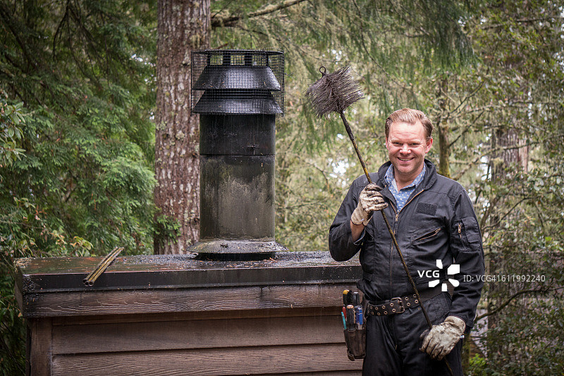 烟囱清扫工清洁烟囱图片素材