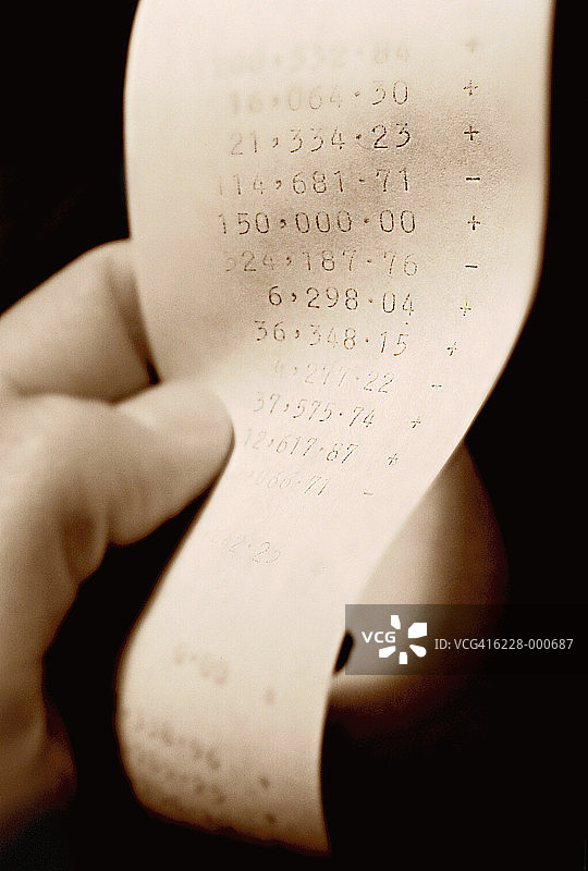 手持计算器纸带图片素材