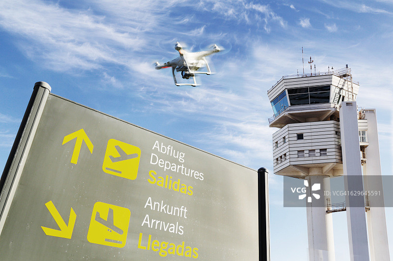 无人机飞越机场图片素材