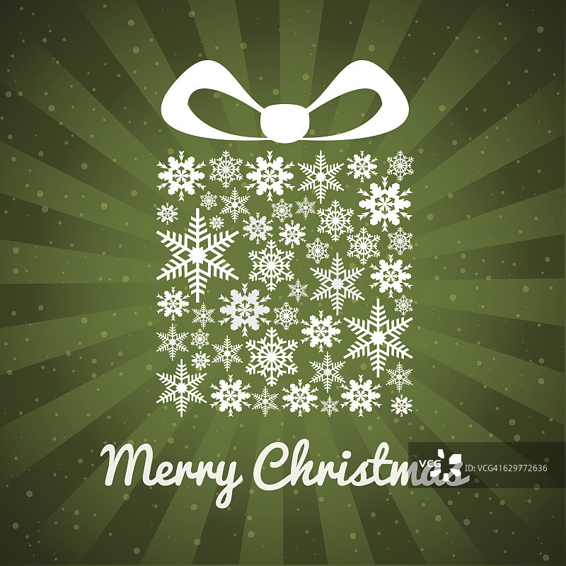 下雪光束背景上的圣诞绿色礼品盒图片素材