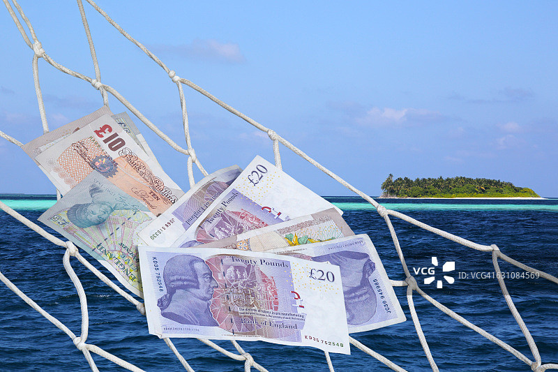 热带岛屿上的吊床和英镑图片素材