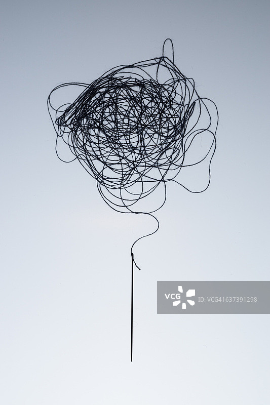 缠绕的线和针的复杂性图片素材