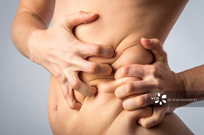 她的侧腹疼痛图片素材