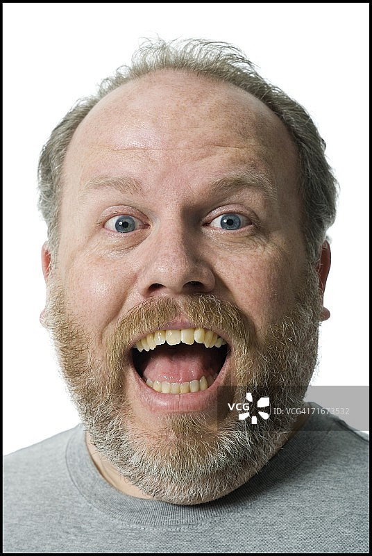 面露惊讶的中年男人肖像图片素材