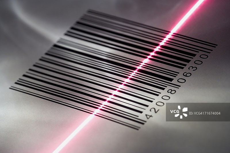 用激光扫描条形码的特写图片素材