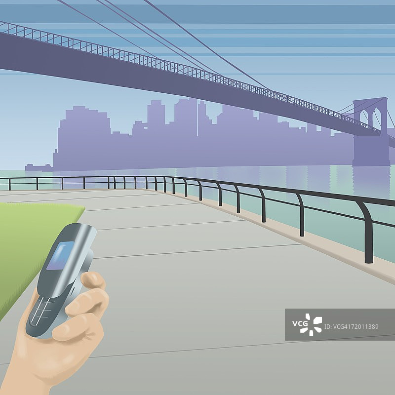 特写：拿着手机的手图片素材