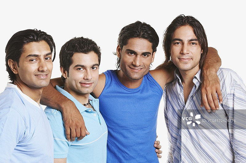 四名微笑的年轻男子肖像图片素材