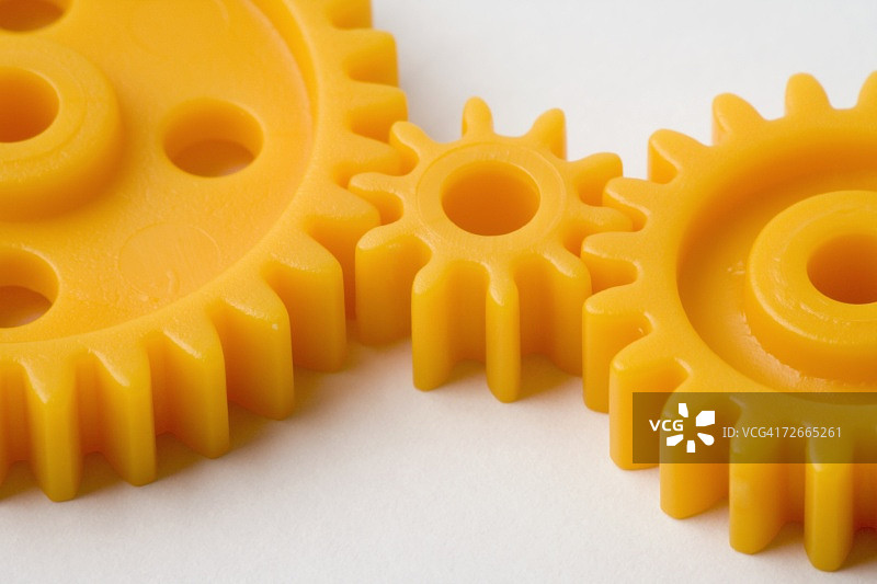 三个相互连接的齿轮图片素材