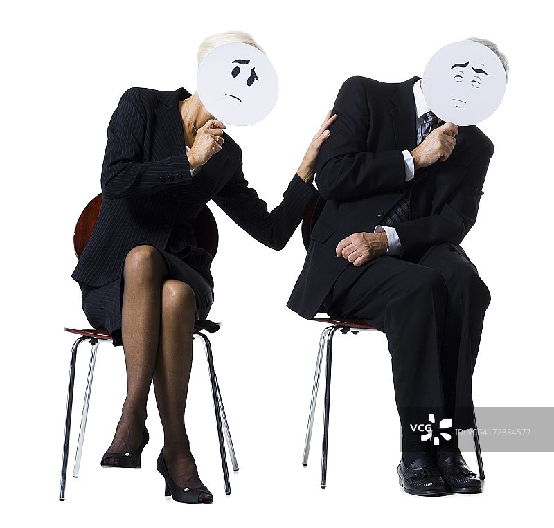 商务人士持有表情面具图片素材