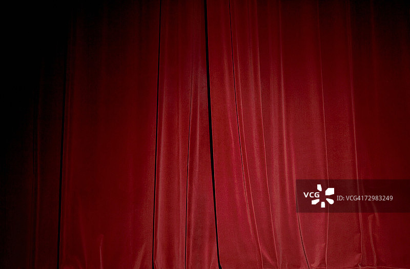 红色天鹅绒舞台幕布特写图片素材