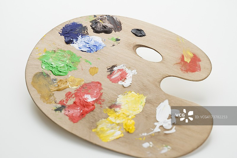带颜料的艺术家调色板的摄影棚照片图片素材