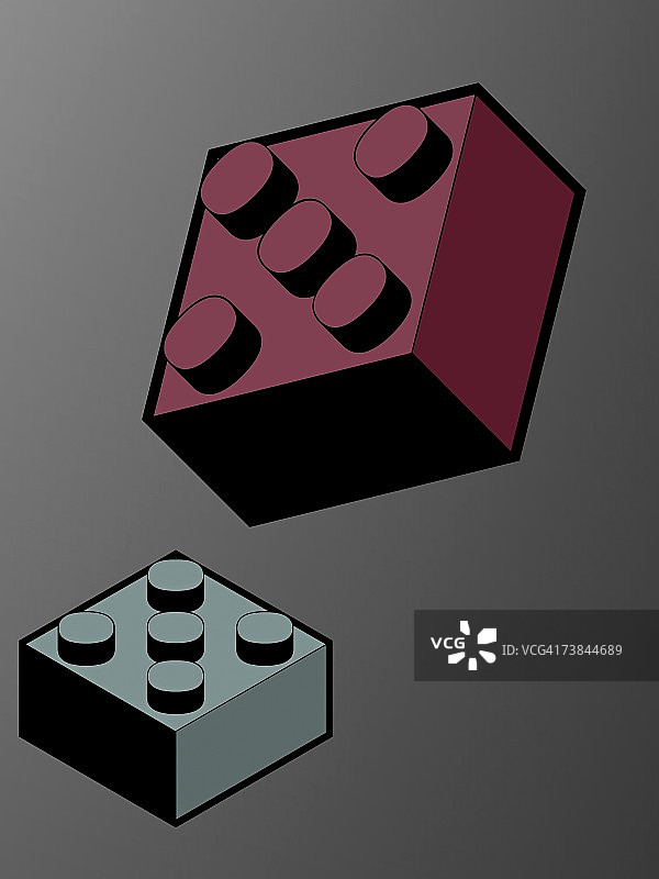 灰色背景上的两个塑料积木特写图片素材