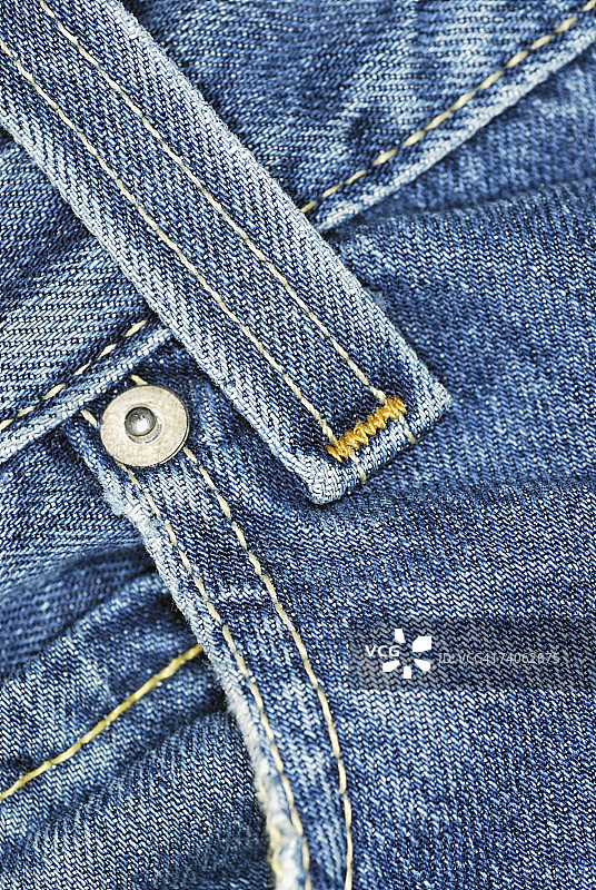 牛仔裤上的腰带环特写图片素材