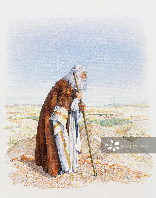 摩西拄着拐杖眺望应许之地图片素材