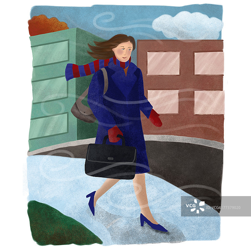 女商人走在寒冷的冬日里图片素材