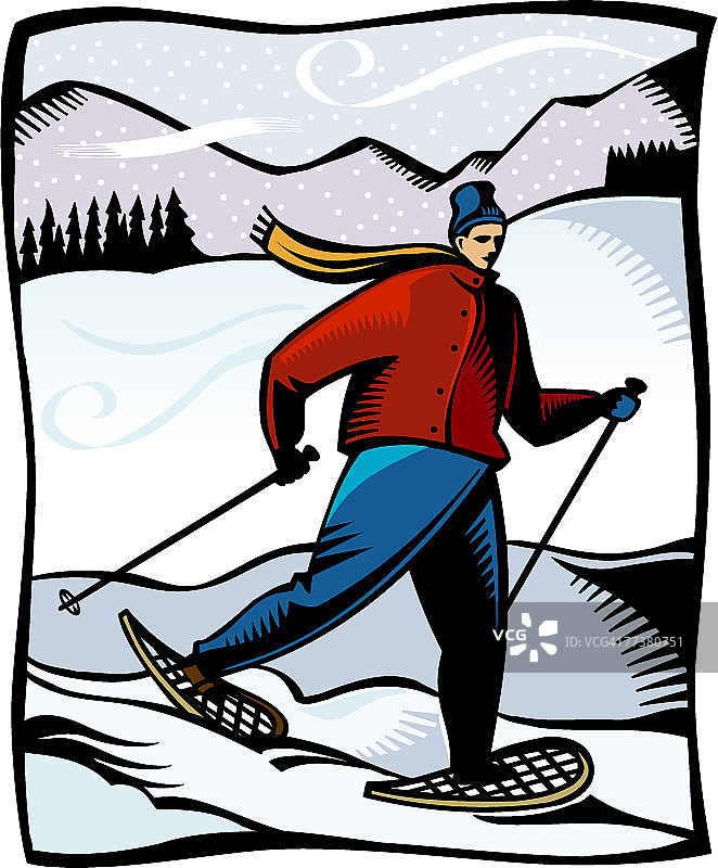 男人在雪山上穿着雪鞋行走图片素材