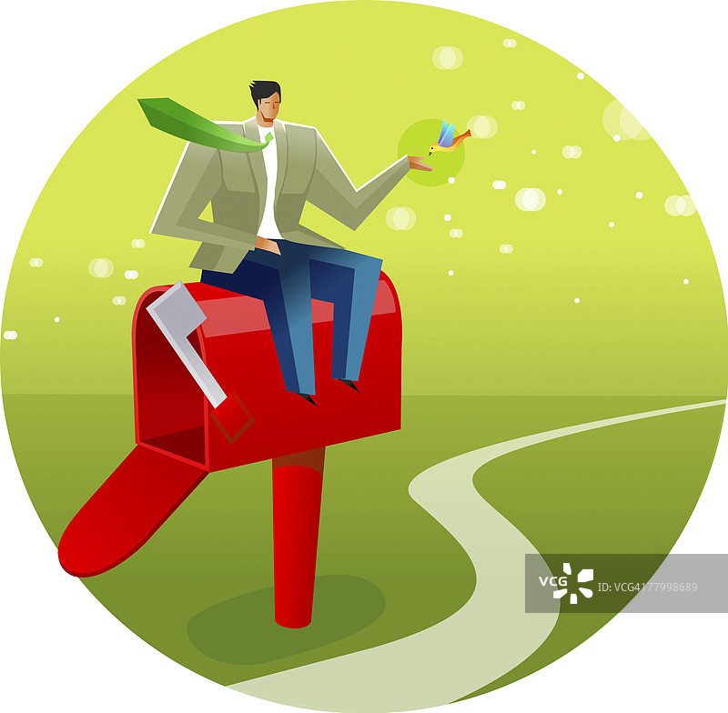 坐在邮箱上喂鸟的商人图片素材