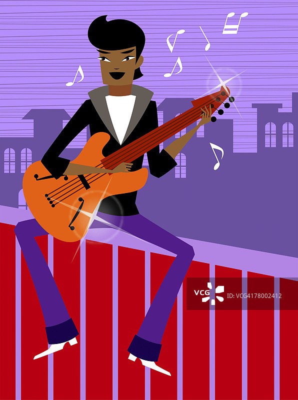 坐在墙上弹吉他的男子图片素材