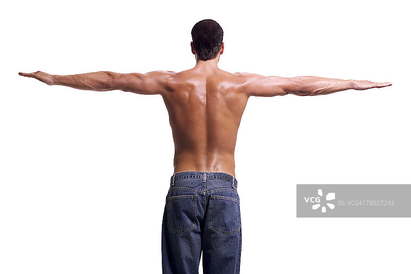 赤膊健壮男人伸展双臂的背影图片素材
