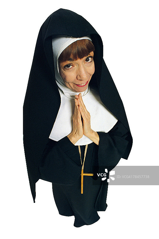 祈祷姿势的修女图片素材