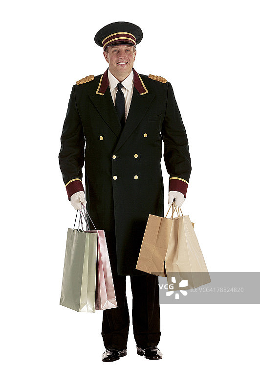 门卫拿着购物袋图片素材