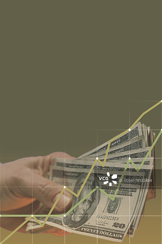 手持金钱与图表的合成图片素材