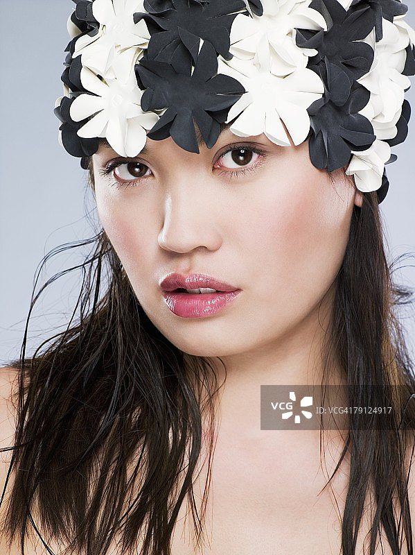 戴着花帽的中国女人图片素材