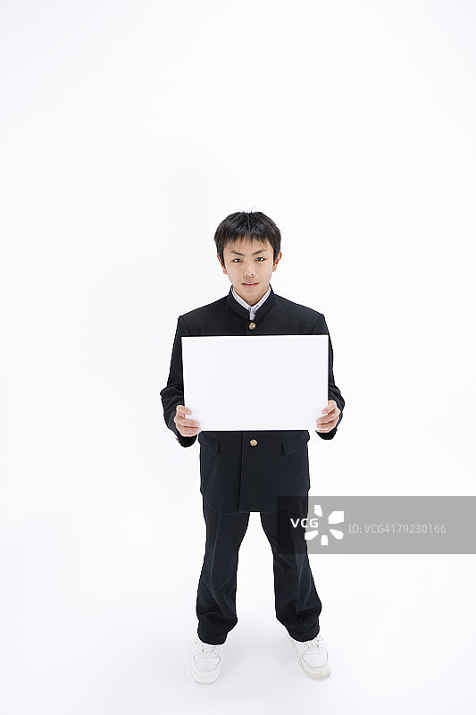 青少年男孩拿着空白留言板图片素材