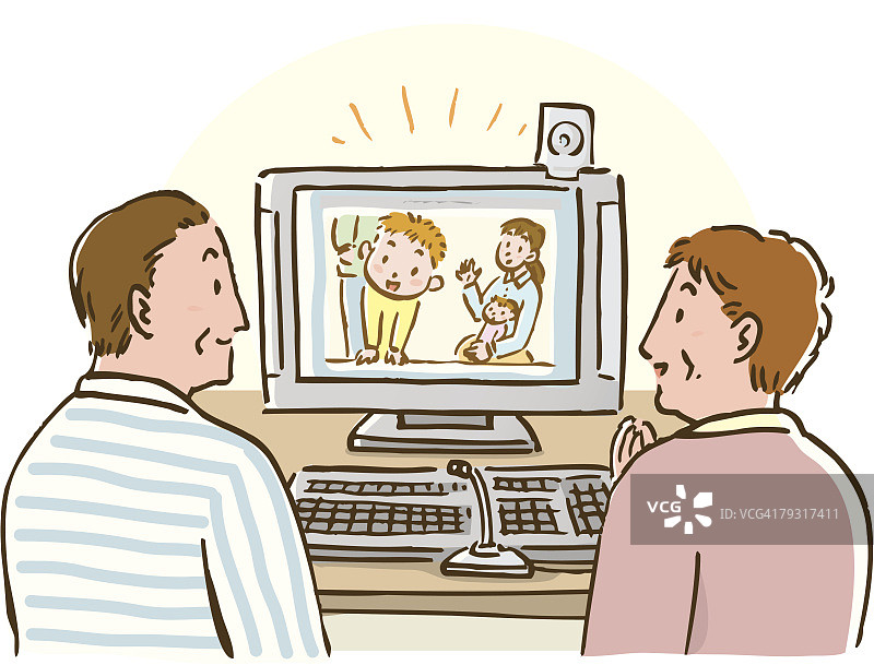 观看电脑屏幕、进行网络通话的男女（后视图）图片素材