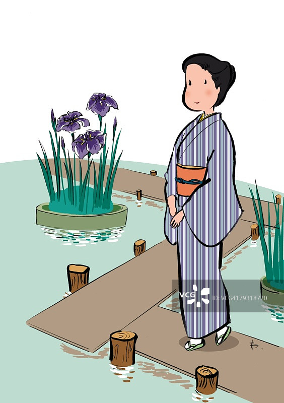 身穿和服的中年妇女在高角度观看鸢尾花园中的鸢尾花图片素材