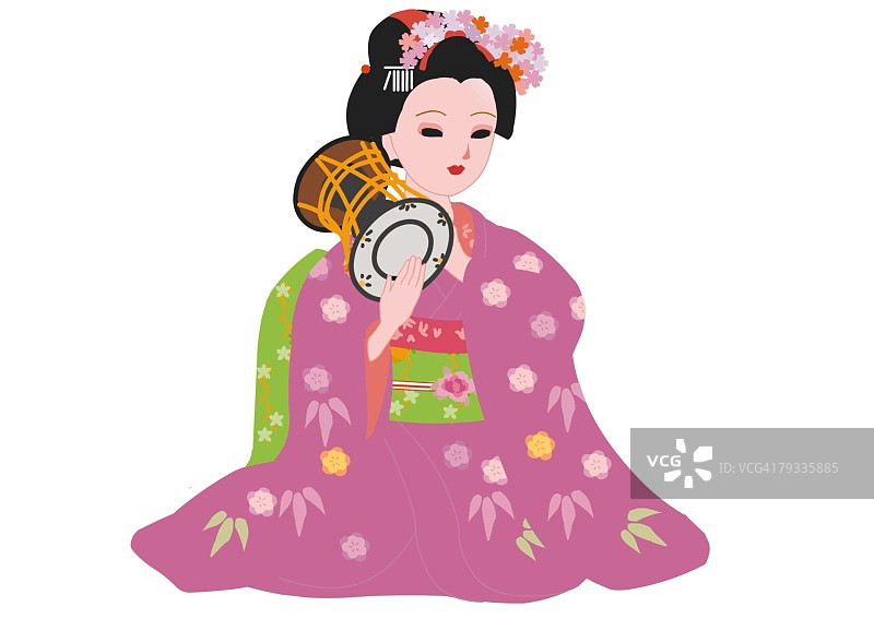 身穿日式服装的女人正在敲击手鼓图片素材