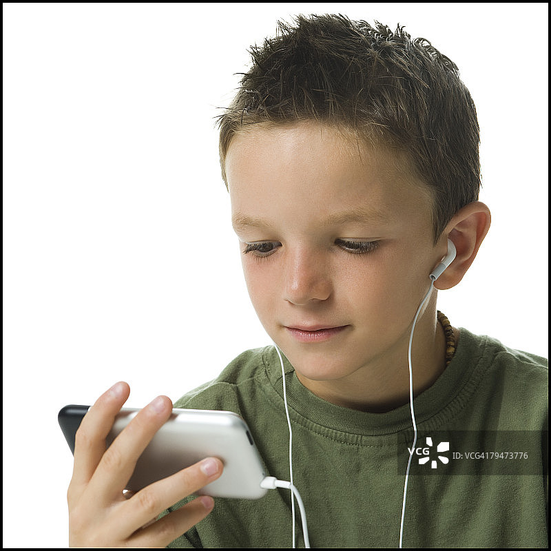 男孩听MP3播放器图片素材