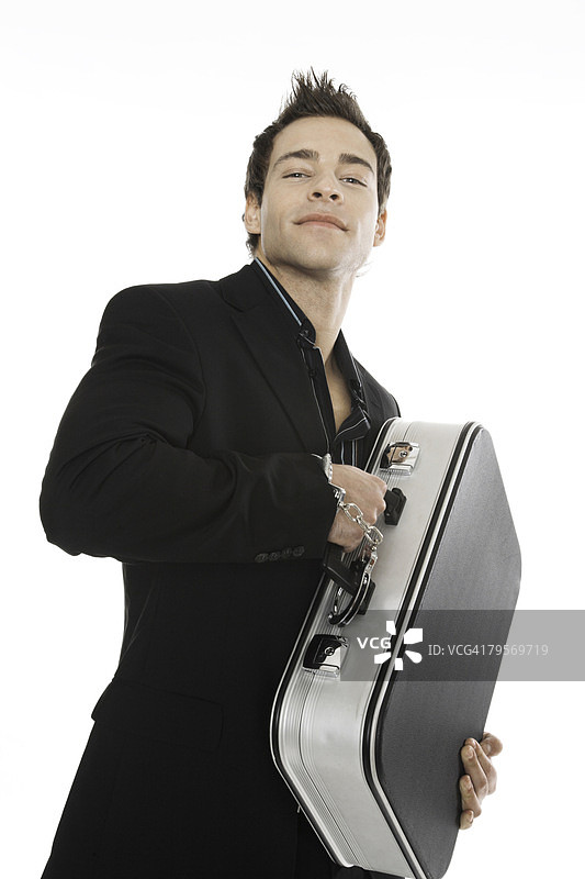 男子手提钱箱特写图片素材