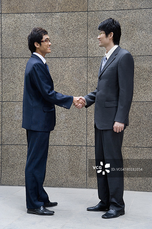 商务人士握手，中国北京图片素材