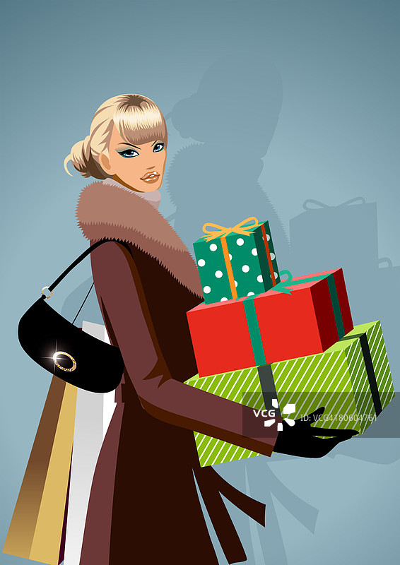 携带圣诞礼物的女人肖像图片素材