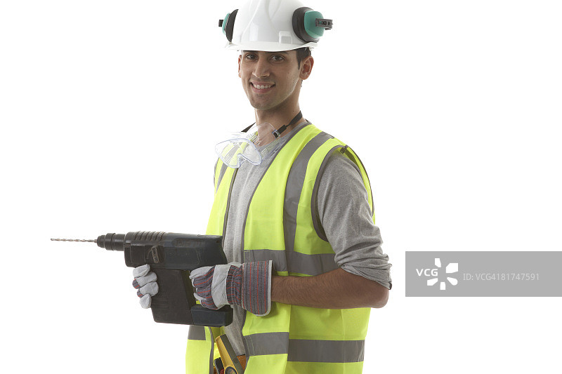 手持钻头的建筑工人图片素材