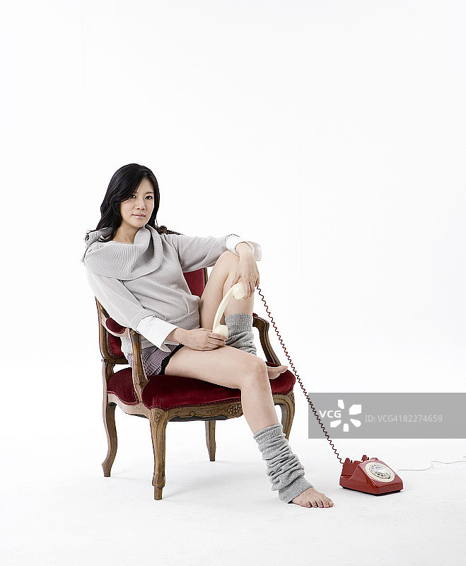 拿着手机的孕妇图片素材